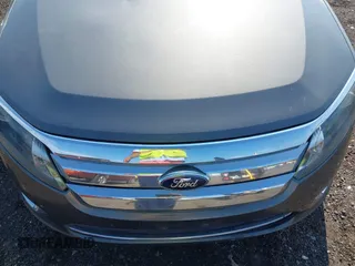 2012 Ford Fusion SEL with VIN 3FAHP0JA9CR363879, listed as a IAAI auction lot 42666264 with 201,958 mi miles and . Bid and sale history available at DreamBid. Image 6.