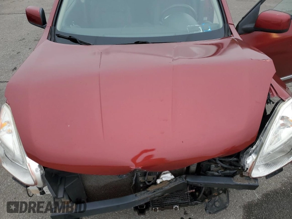 2011 Nissan Rogue SV z VIN JN8AS5MV1BW257562, wystawiony jako Copart lot #60112535 z przebiegiem 67 929 mil mil oraz Szkoda całkowita • Salvage title. Historia ofert i sprzedaży dostępna na DreamBid. Obrazek 12.