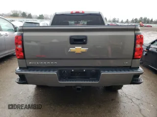 2017 Chevrolet Silverado 1500 LT with VIN 3GCUKREC0HG287527, listed as a Copart auction lot 84900274 with 121,617 mi miles and Salvage Title. Bid and sale history available at DreamBid. Image 6.