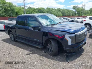 2023 Ford F-150 Lightning Pro with VIN 1FT6W1EVXPWG42428, listed as a IAAI auction lot 39711091 with 6,308 mi miles. Bid and sale history available at carsss.com. Image 1.