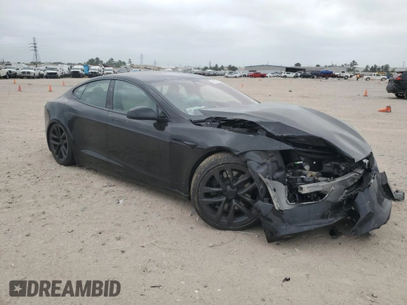 2023 Tesla Model S z VIN 5YJSA1E58PF531166, wystawiony jako Copart lot #51827565 z przebiegiem Nie podano mil oraz Szkoda całkowita • Salvage title. Historia ofert i sprzedaży dostępna na DreamBid. Obrazek 4.