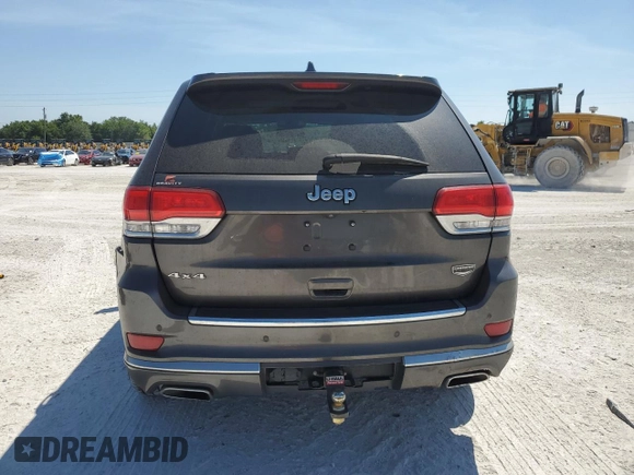 2014 Jeep Grand Cherokee Summit with VIN 1C4RJFJGXEC159438, listed as a Copart auction lot 50864595 with 134,558 mi miles and Salvage title. Bid and sale history available at DreamBid. Image 6.