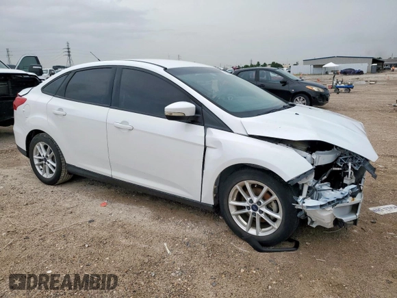 2016 Ford Focus SE with VIN 1FADP3F29GL259317, listed as a Copart auction lot 62646685 with 100,523 mi miles and Salvage title. Bid and sale history available at DreamBid. Image 4.