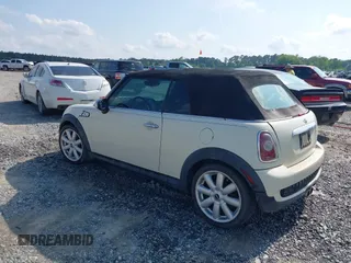 2010 MINI Convertible S with VIN WMWMS3C58ATY09098, listed as a IAAI auction lot 42149773 with 127,424 mi miles and . Bid and sale history available at DreamBid. Image 3.