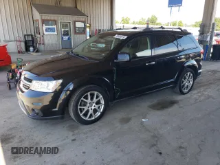 2013 Dodge Journey R/T with VIN 3C4PDDFG6DT648370, listed as a Copart auction lot 81697154 with 206,690 mi miles and Non repairable. Bid and sale history available at DreamBid. Image 1.
