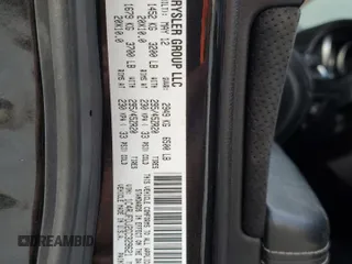 2012 Jeep Grand Cherokee SRT8 with VIN 1C4RJFDJ2CC329621, listed as a Copart auction lot 86772154 with 236,800 mi miles and Salvage Title. Bid and sale history available at carsss.com. Image 14.
