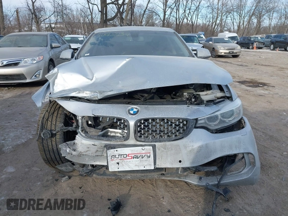 2015 BMW 4 Series 428i xDrive with VIN WBA3N9C53FK247985, listed as a IAAI auction lot 41395534 with 76,856 mi miles and . Bid and sale history available at DreamBid. Image 12.