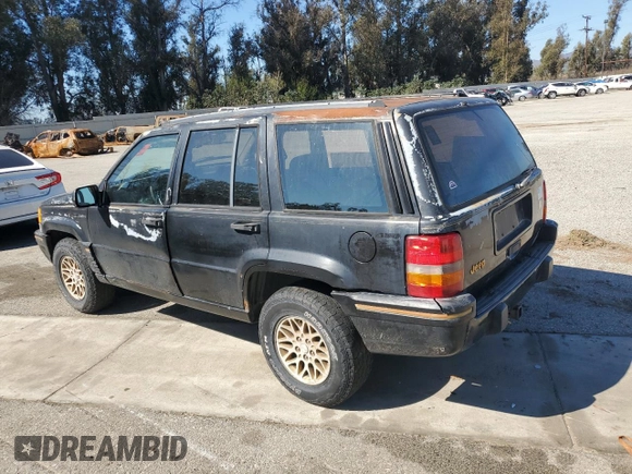 1993 Jeep Grand Cherokee Limited with VIN 1J4GZ78S3PC502345, listed as a Copart auction lot 46933805 with 121,652 mi miles and Salvage title. Bid and sale history available at DreamBid. Image 2.