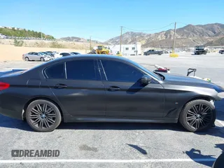 2020 BMW 5 Series 530e with VIN WBAJA9C02LCD31800, listed as a IAAI auction lot 41669765 with 99,024 mi miles and . Bid and sale history available at DreamBid. Image 14.