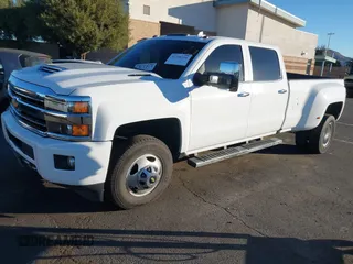 2018 Chevrolet Silverado 3500HD High Country with VIN 1GC4K1EY6JF207068, listed as a IAAI auction lot 41288394 with 110,158 mi miles and . Bid and sale history available at DreamBid. Image 2.