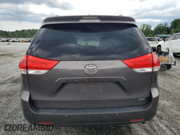 2012 Toyota Sienna XLE AAS with VIN 5TDYK3DC0CS251735, listed as a Copart auction lot 62208805 with 217,504 mi miles and Clean title. Bid and sale history available at DreamBid. Image 6.