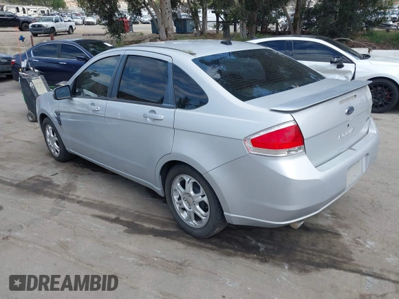 2008 Ford Focus SE with VIN 1FAHP35N18W199448, listed as a IAAI auction lot 42088860 with 174,391 mi miles. Bid and sale history available at carsss.com. Image 3.