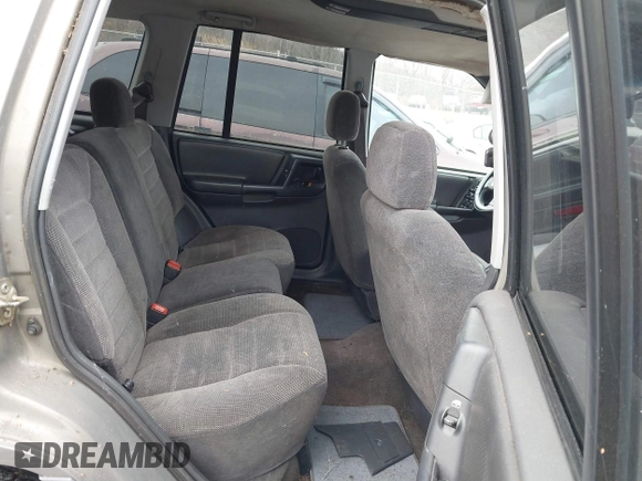 1996 Jeep Grand Cherokee with VIN 1J4EZ58S1TC112995, listed as a IAAI auction lot 41706966 with 356,727 mi miles and . Bid and sale history available at DreamBid. Image 8.