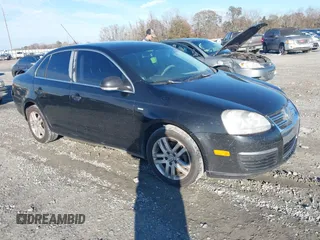 2007 Volkswagen Jetta Wolfsburg Edition z VIN 3VWEF71K87M193337, wystawiony jako IAAI lot #41386896 z przebiegiem 202 333 mil mil oraz . Historia ofert i sprzedaży dostępna na DreamBid. Obrazek 1.
