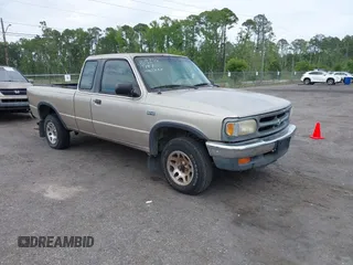 1997 Mazda B-Series Truck LE z VIN 4F4DR17X5VTM29258, wystawiony jako IAAI lot #42205942 z przebiegiem 271 473 mil mil oraz . Historia ofert i sprzedaży dostępna na DreamBid. Obrazek 1.