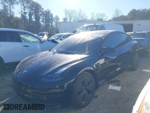 2022 Tesla Model 3 with VIN 5YJ3E1EA9NF147836, listed as a IAAI auction lot 41363603 with 28,748 mi miles. Bid and sale history available at carsss.com. Image 14.