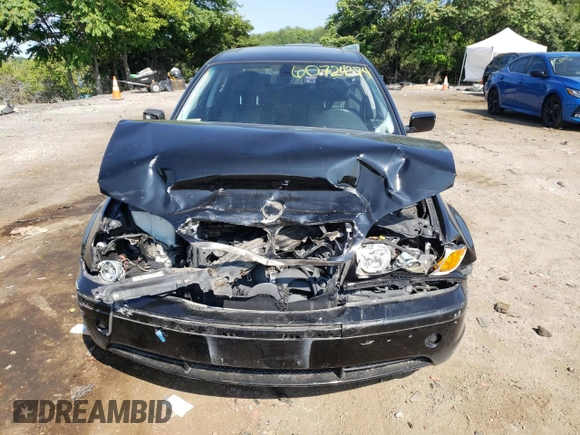 2003 BMW 3 Series 330xi with VIN WBAEW53413PG21999, listed as a Copart auction lot 60724374 with 137,242 mi miles and Salvage Title. Bid and sale history available at carsss.com. Image 5.