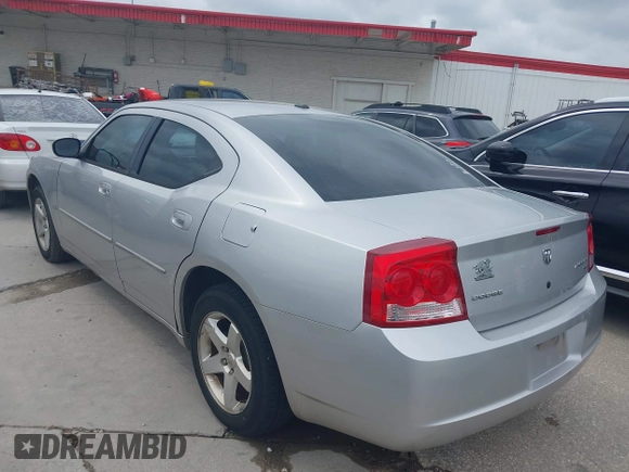 2010 Dodge Charger SXT with VIN 2B3CA3CV2AH227658, listed as a IAAI auction lot 42101656 with 162,392 mi miles. Bid and sale history available at carsss.com. Image 3.
