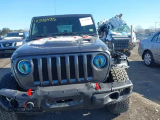 2020 Jeep Wrangler Unlimited Rubicon with VIN 1C4HJXFG3LW291155, listed as a IAAI auction lot 41348485 with 72,481 mi miles and . Bid and sale history available at DreamBid. Image 12.