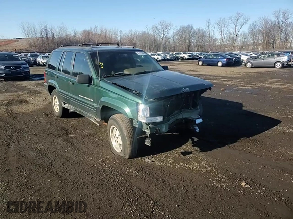 1998 Jeep Grand Cherokee Laredo with VIN 1J4GZ48S4WC239246, listed as a Copart auction lot 86101204 with 0 mi miles and Salvage Title. Bid and sale history available at carsss.com. Image 12.