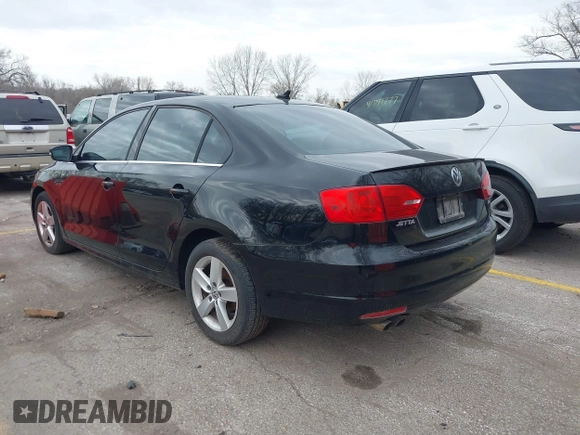 2012 Volkswagen Jetta TDI w/Premium with VIN 3VWLL7AJ9CM367840, listed as a IAAI auction lot 41868444 with 176,486 mi miles and . Bid and sale history available at DreamBid. Image 3.