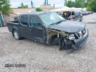 2015 Nissan Frontier SL with VIN 1N6AD0EV1FN764719, listed as a IAAI auction lot 42512771 with 104,572 mi miles and . Bid and sale history available at DreamBid. Image 1.