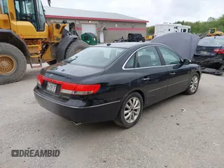 2007 Hyundai Azera SE z VIN KMHFC46F67A244191, wystawiony jako IAAI lot #42273775 z przebiegiem 178 713 mil mil oraz . Historia ofert i sprzedaży dostępna na DreamBid. Obrazek 4.