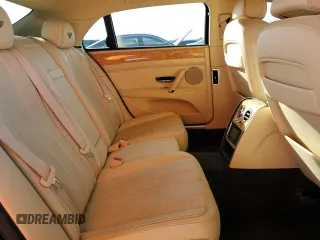2014 Bentley Flying Spur z VIN SCBEC9ZA2EC090466, wystawiony jako Copart lot #43833305 z przebiegiem 53 837 mil mil oraz Szkody całkowita. Historia ofert i sprzedaży dostępna na DreamBid. Obrazek 10.