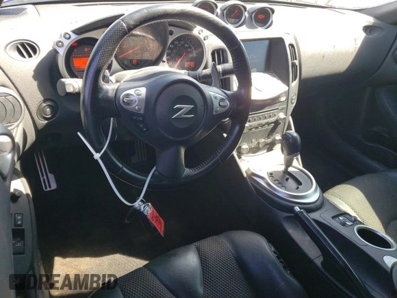 2014 Nissan 370Z Touring with VIN JN1AZ4FH4EM620612, listed as a Copart auction lot 47163375 with 148,458 mi miles and Clean Title. Bid and sale history available at DreamBid. Image 8.