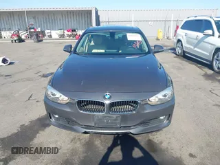 2014 BMW 3 Series 328i with VIN WBA3C1C57EK116483, listed as a IAAI auction lot 42697759 with 113,010 mi miles and . Bid and sale history available at DreamBid. Image 13.