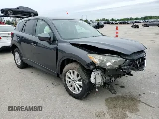 2014 Mazda CX-5 Touring z VIN JM3KE4CY2E0368729, wystawiony jako Copart lot #55563645 z przebiegiem 204 521 mil mil oraz Szkoda całkowita • Salvage title. Historia ofert i sprzedaży dostępna na DreamBid. Obrazek 14.