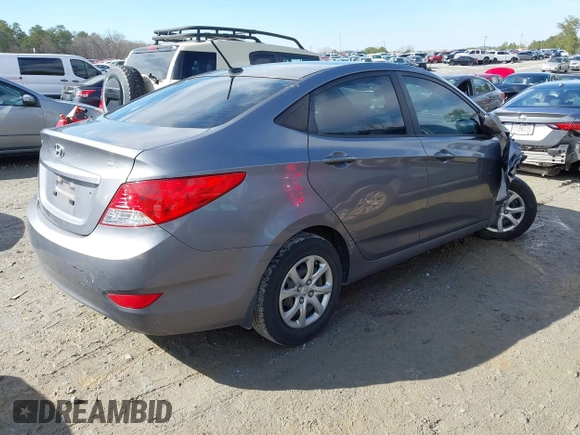 2014 Hyundai Accent GLS with VIN KMHCT4AEXEU710606, listed as a IAAI auction lot 41764163 with 103,859 mi miles. Bid and sale history available at carsss.com. Image 4.