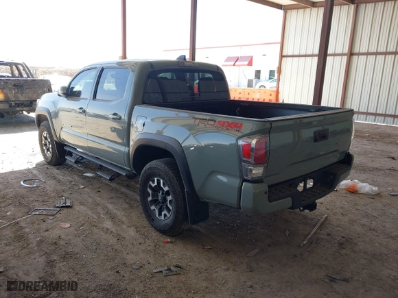 2023 Toyota Tacoma 4WD SR with VIN 3TMCZ5ANXPM613857, listed as a IAAI auction lot 41771957 with 76,232 mi miles. Bid and sale history available at carsss.com. Image 3.