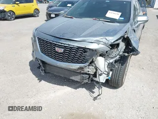 2023 Cadillac XT4 AWD Premium Luxury with VIN 1GYFZDR47PF163923, listed as a IAAI auction lot 42136236 with 52,012 mi miles and . Bid and sale history available at DreamBid. Image 6.