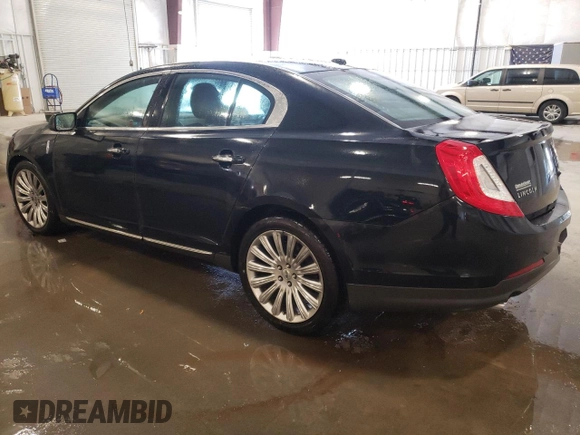 2014 Lincoln MKS with VIN 1LNHL9DK3EG611354, listed as a Copart auction lot 49008525 with 114,232 mi miles and Salvage Title. Bid and sale history available at carsss.com. Image 2.