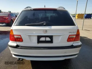 2003 BMW 3 Series 325i with VIN WBAEN33483PC12177, listed as a Copart auction lot 54206945 with 125,512 mi miles and Salvage Title. Bid and sale history available at DreamBid. Image 6.