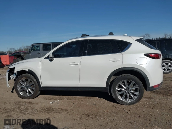 2020 Mazda CX-5 Grand Touring with VIN JM3KFADM5L1815374, listed as a IAAI auction lot 41416077 with 44,190 mi miles. Bid and sale history available at carsss.com. Image 13.