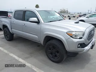 2019 Toyota Tacoma SR5 with VIN 3TMAZ5CN9KM109152, listed as a IAAI auction lot 42385584 with 58,867 mi miles and . Bid and sale history available at DreamBid. Image 1.