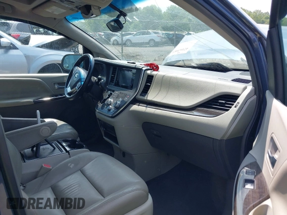 2016 Toyota Sienna XLE z VIN 5TDYK3DC2GS739042, wystawiony jako IAAI lot #42163983 z przebiegiem 98 842 mil mil oraz . Historia ofert i sprzedaży dostępna na DreamBid. Obrazek 5.