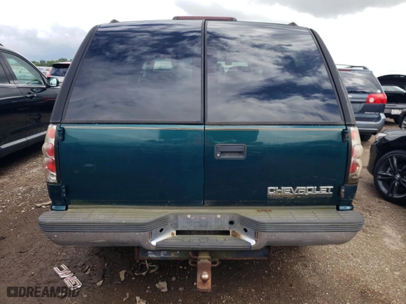 1997 Chevrolet Tahoe with VIN 1GNEK13R0VJ388887, listed as a Copart auction lot 64299984 with 179,683 mi miles and Clean Title. Bid and sale history available at carsss.com. Image 6.