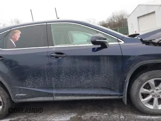 2016 Lexus RX 450h z VIN 2T2BGMCA9GC002616, wystawiony jako IAAI lot #41634044 z przebiegiem 68 310 mil mil oraz . Historia ofert i sprzedaży dostępna na DreamBid. Obrazek 13.