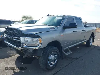 2021 Ram 2500 Tradesman with VIN 3C6UR5HJ9MG610232, listed as a IAAI auction lot 41072104 with 22,196 mi miles and . Bid and sale history available at DreamBid. Image 2.