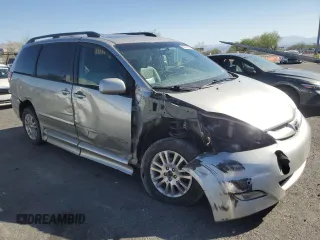2010 Toyota Sienna XLE with VIN 5TDYK4CC3AS324570, listed as a Copart auction lot 60474005 with 259,128 mi miles and Salvage title. Bid and sale history available at DreamBid. Image 4.