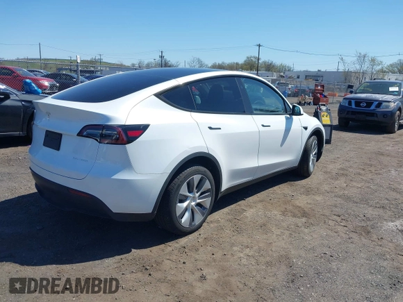 2023 Tesla Model Y Long Range with VIN 7SAYGDEE3PA201719, listed as a IAAI auction lot 42048816 with Not Provided miles and . Bid and sale history available at DreamBid. Image 4.