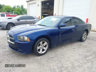 2013 Dodge Charger SE z VIN 2C3CDXBG7DH580034, wystawiony jako IAAI lot #42209139 z przebiegiem 185 906 mil mil oraz . Historia ofert i sprzedaży dostępna na DreamBid. Obrazek 2.
