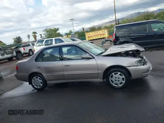 1999 Toyota Corolla VE with VIN 1NXBR12E4XZ182751, listed as a IAAI auction lot 41433066 with 56,904 mi miles and . Bid and sale history available at DreamBid. Image 13.