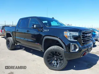 2021 GMC Sierra 1500 AT4 with VIN 3GTP9EED5MG206008, listed as a IAAI auction lot 41665423 with 61,685 mi miles. Bid and sale history available at carsss.com. Image 1.