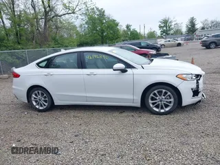 2020 Ford Fusion SE with VIN 3FA6P0LU5LR151074, listed as a IAAI auction lot 42146290 with 98,574 mi miles and . Bid and sale history available at carsss.com. Image 14.