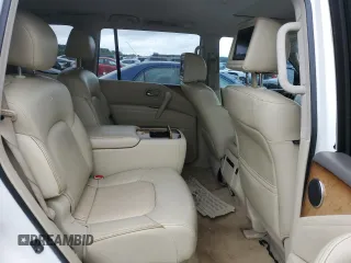 2012 Infiniti QX56 7-passenger z VIN JN8AZ2NE0C9022997, wystawiony jako Copart lot #58497615 z przebiegiem Nie podano mil oraz Tytuł czysty. Historia ofert i sprzedaży dostępna na DreamBid. Obrazek 11.