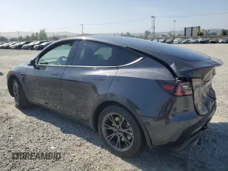 2024 Tesla Model Y Long Range z VIN 7SAYGDEE3RF121102, wystawiony jako Copart lot #60548895 z przebiegiem 13 336 mil mil oraz Szkoda całkowita • Salvage title. Historia ofert i sprzedaży dostępna na DreamBid. Obrazek 2.